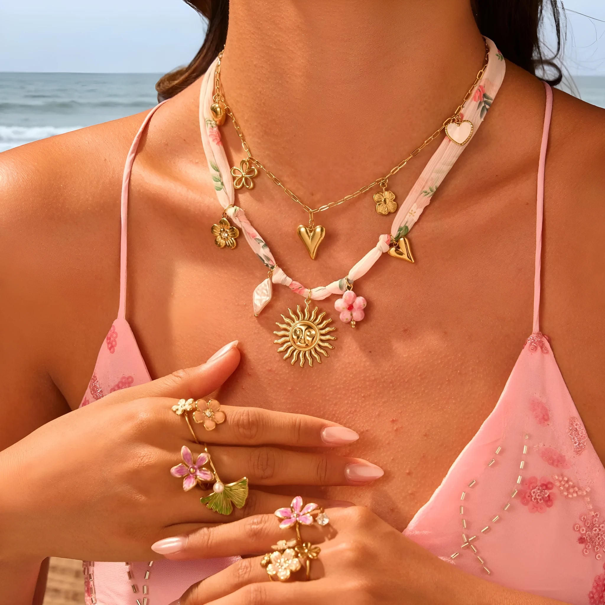 Gold plated stainless steel necklace with sun pendant on 41-50cm chain, heart pendant alternative shown