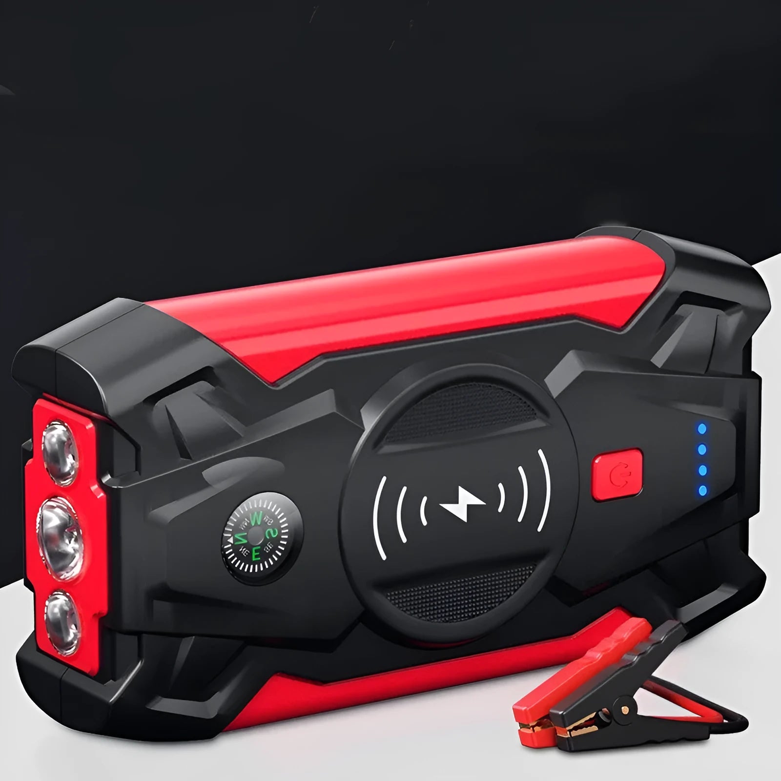 Red car emergency jump starter power pack with digital display and air pump inside a storage case.