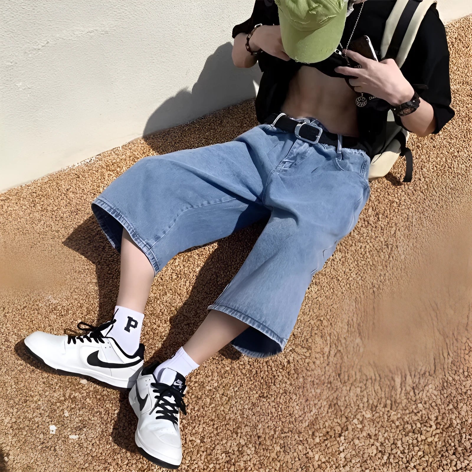 Men's blue washed denim shorts with high waist and cropped straight leg design