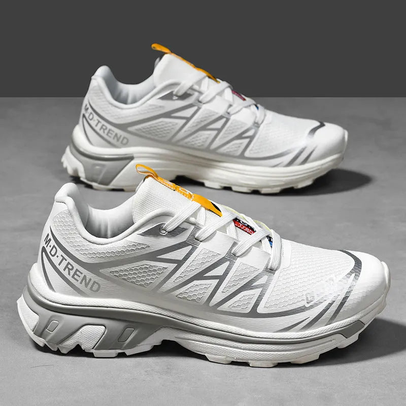 Low-top lace-up hiking shoes in khaki colour with round toe and rubber sole for casual outdoor wear.