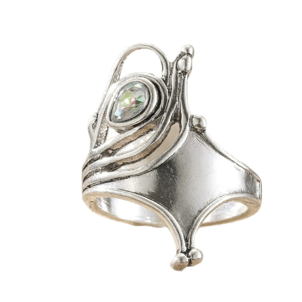 Retro wide hollow ring for women in silver zinc alloy electroplated finish on white background