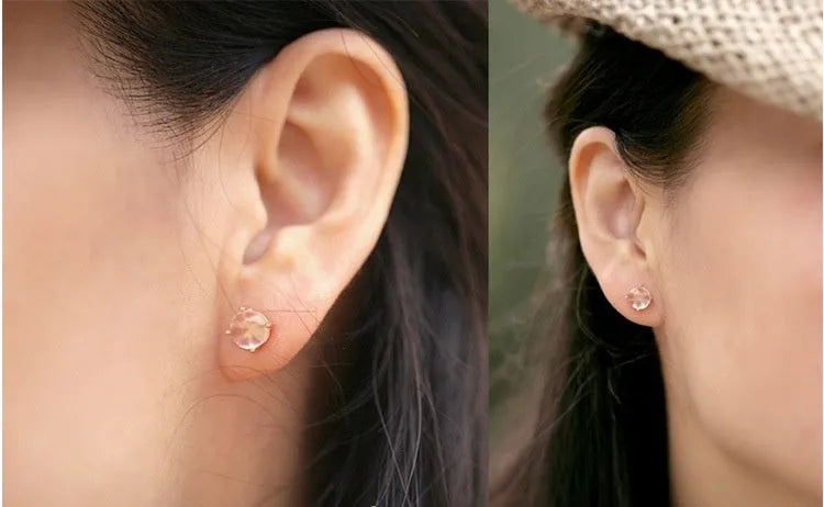 Women's rose gold drop shape stud earrings with synthetic ross quartz crystal inlay