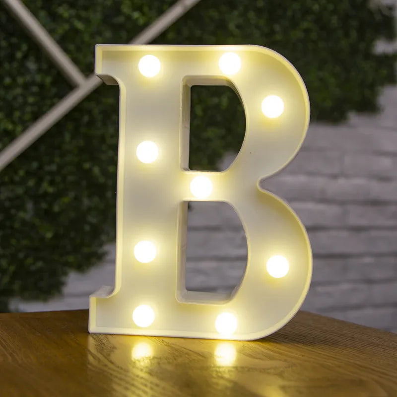 White plastic LED marquee letter sign with warm white glow, 22cm tall