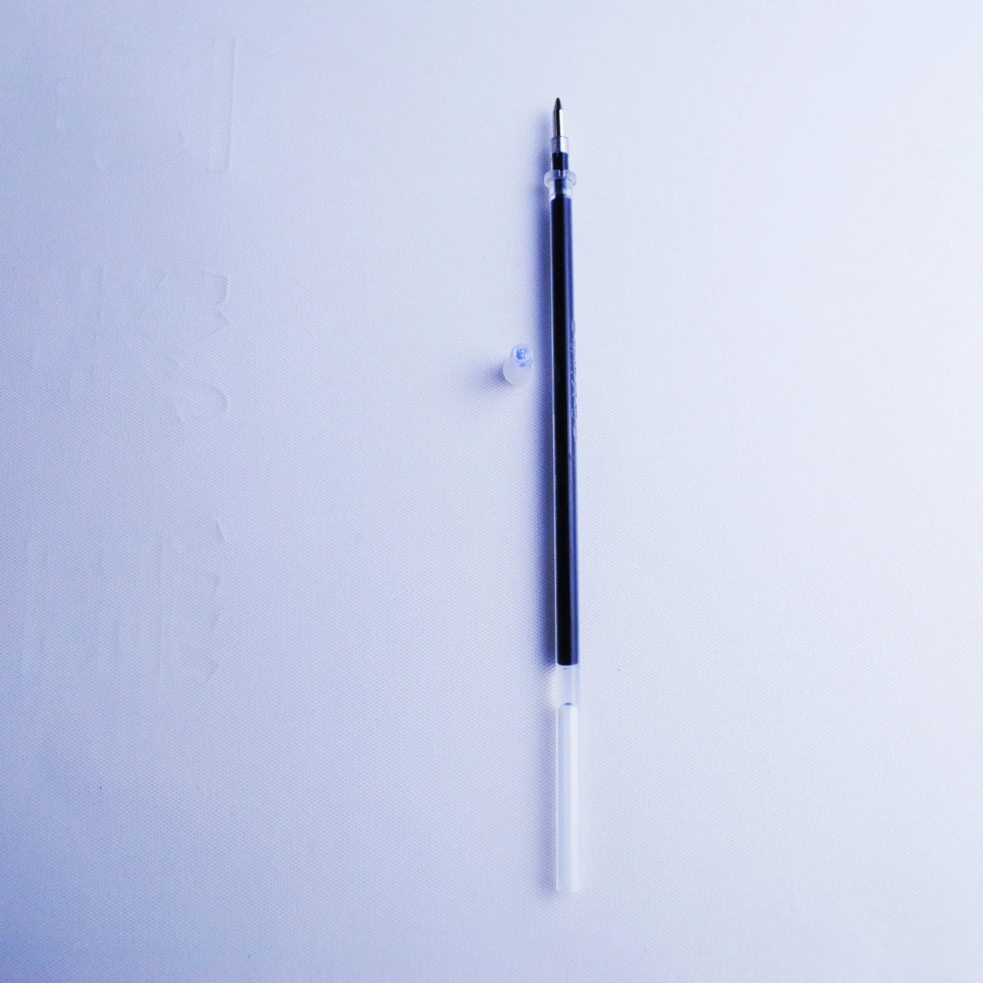 Portable automatic fading ink pen set with 0.5mm tip and blue refill cartridge