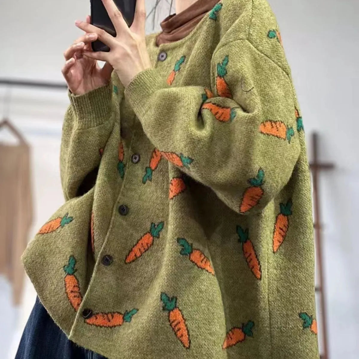 Women's loose grey cardigan with white Mori artistic forest pattern print and colour contrast details.