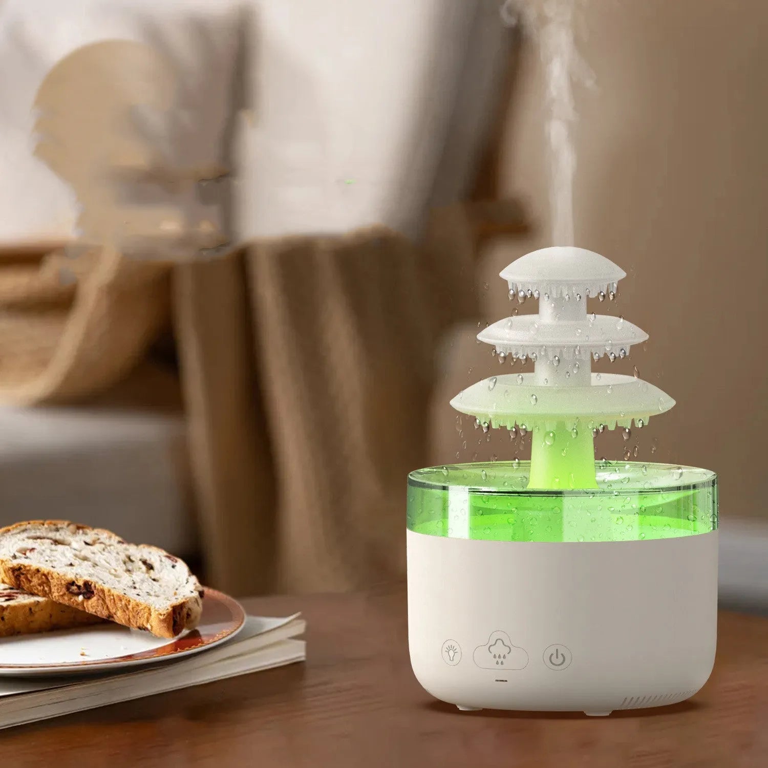 White cloud rain ultrasonic humidifier and essential oil diffuser with colourful LED lights on desk