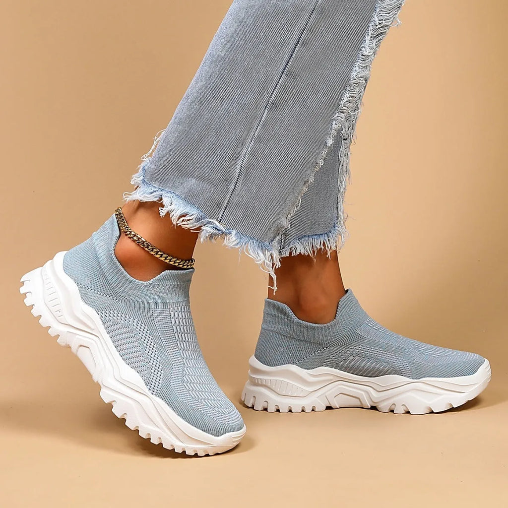 Women's light blue mesh slip-on casual shoes with round toe design