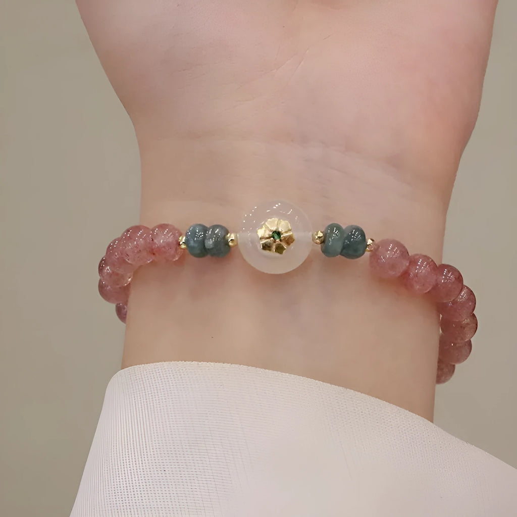 Strawberry quartz bracelet with blue water emerald pendant and Chinese geometric motifs