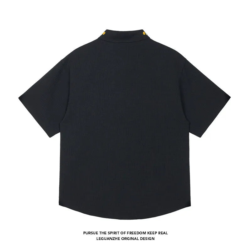 Embroidered short sleeve shirt in black with loose fit, polyester fabric, size M to 5XL