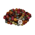 Multi-layer bracelet with 108 dark green tourmaline beads on a silver-toned alloy chain in a lotus design.