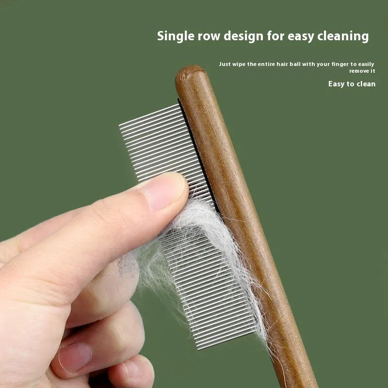 Stainless steel dense tooth flea comb for dogs and cats on a white background