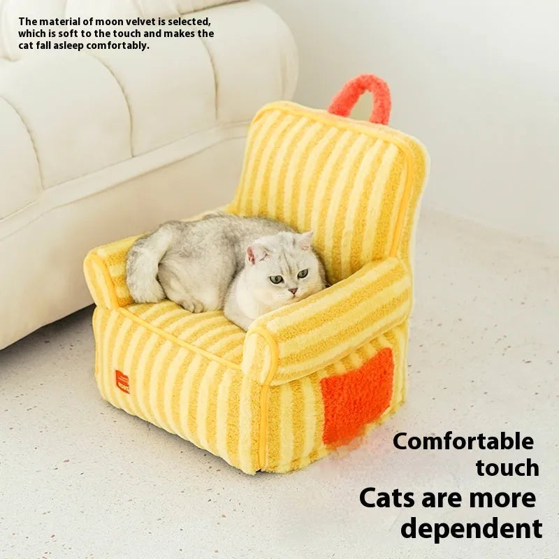 Striped orange soft velvet dog bed with a removable washable cover on a wooden floor.