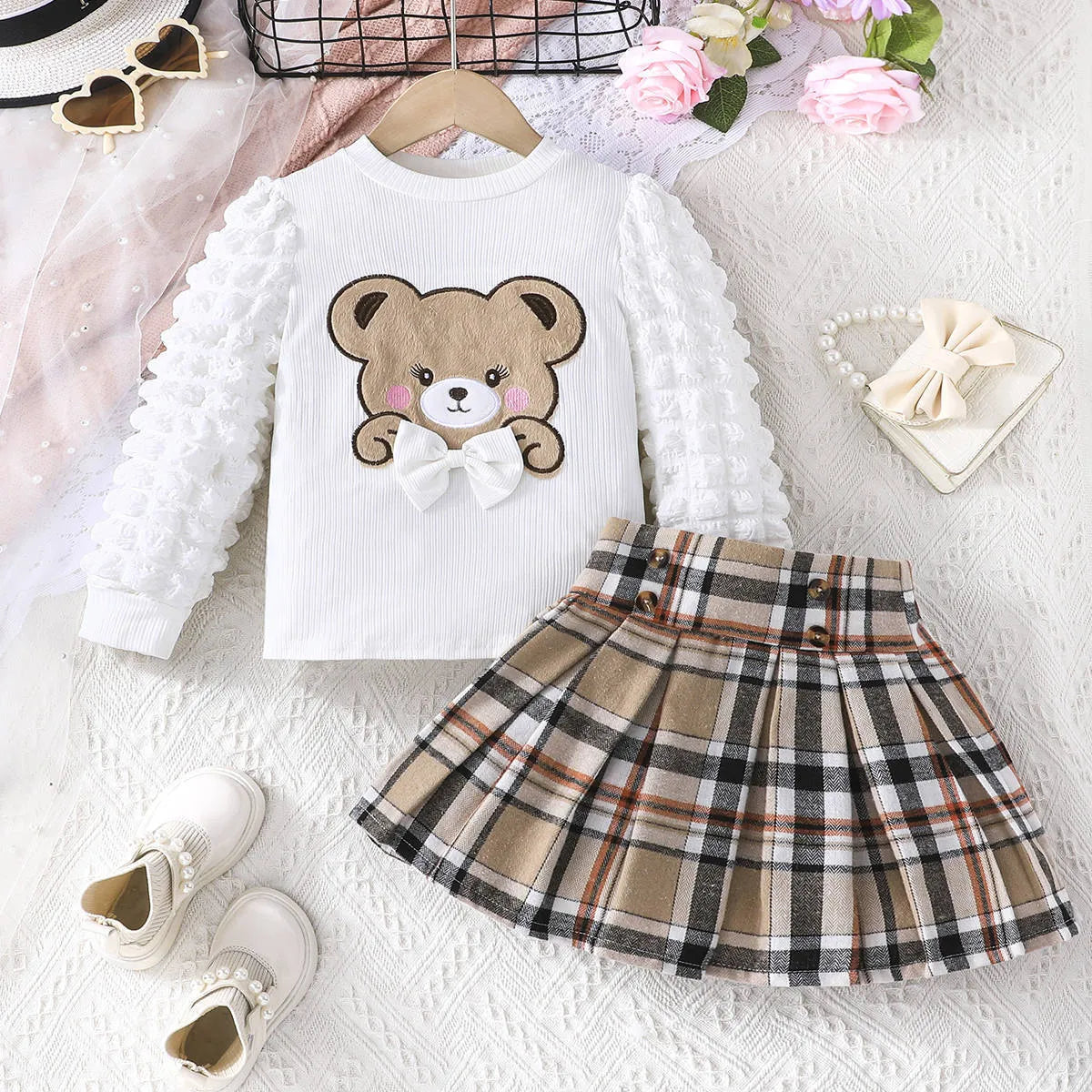 Beige children's cartoon bear print top and plaid skirt two-piece suit for girls