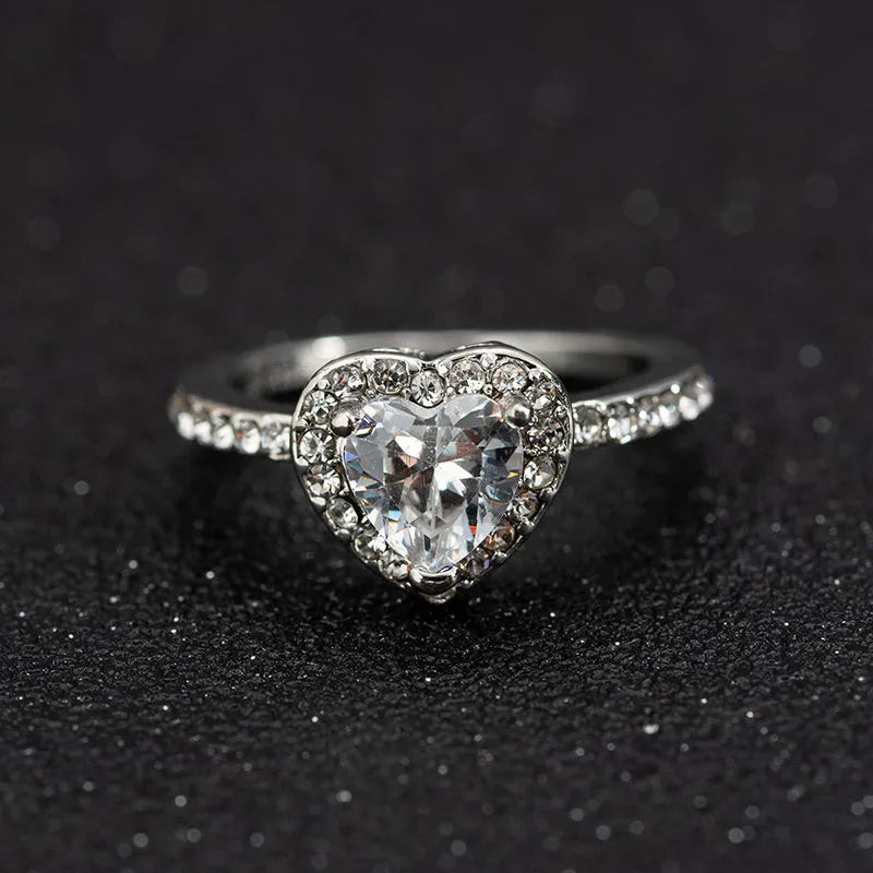 White copper women's wedding ring with heart-shaped crystal in rose gold or silvery finish
