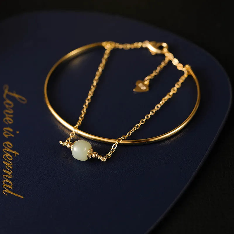 Women's jade lucky beads bracelet with gold inlay, shown in single, double, and three-bead versions.