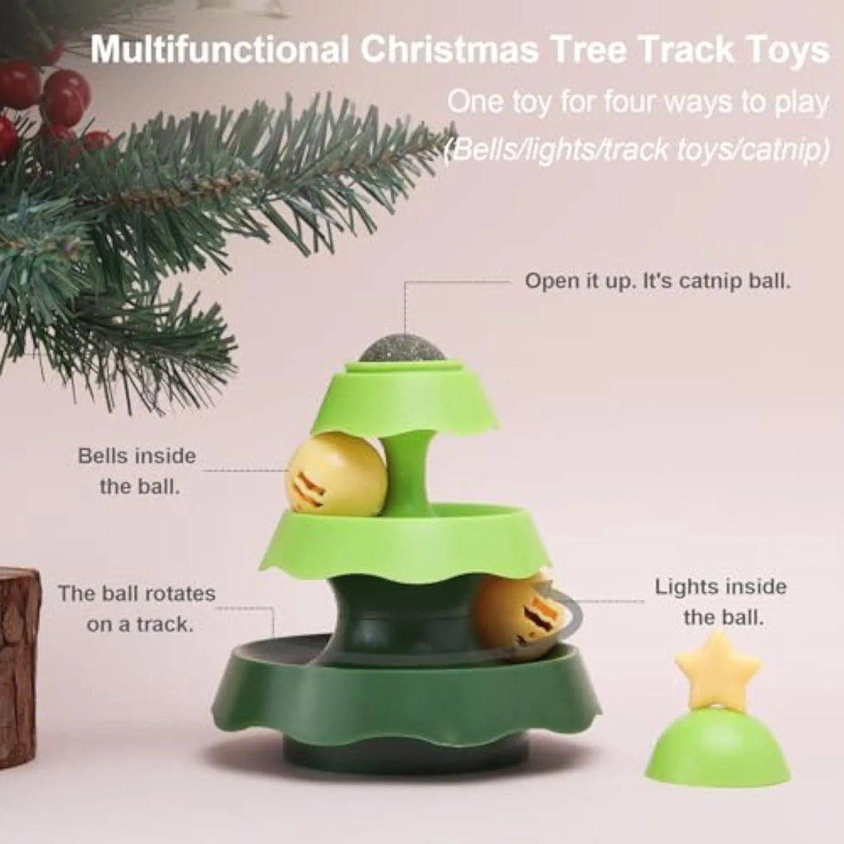 Tree-shaped cat toy track with two tiers of rolling balls and a catnip ball under a green cover on the floor