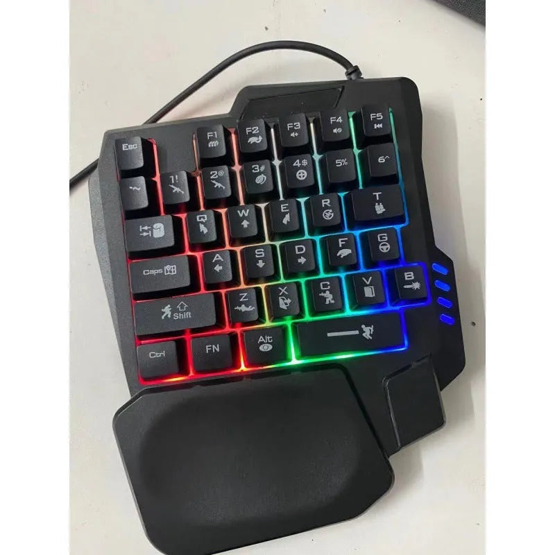 Single-handed mechanical keyboard and mouse set with 1.5 metre cable on desk