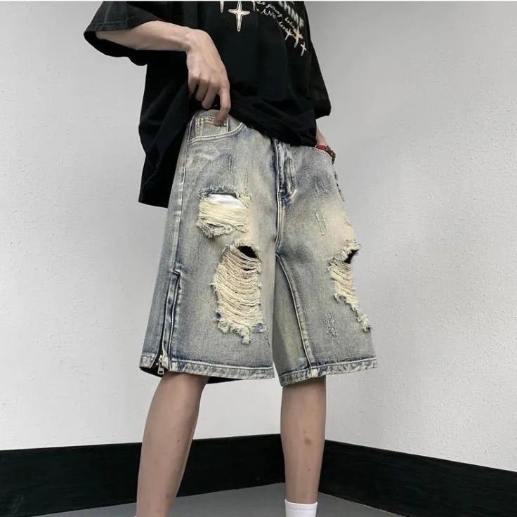Blue retro distressed denim shorts with wide-leg loose fit on Asian size mannequin