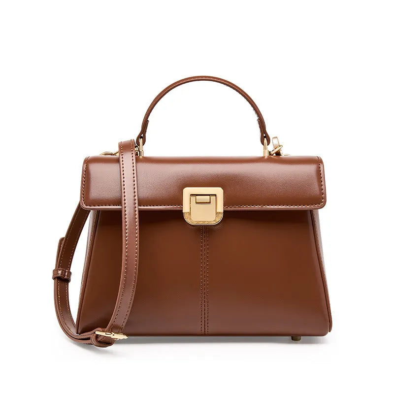 Black genuine leather women's shoulder bag with Vachette clasp, shown in a horizontal square shape.
