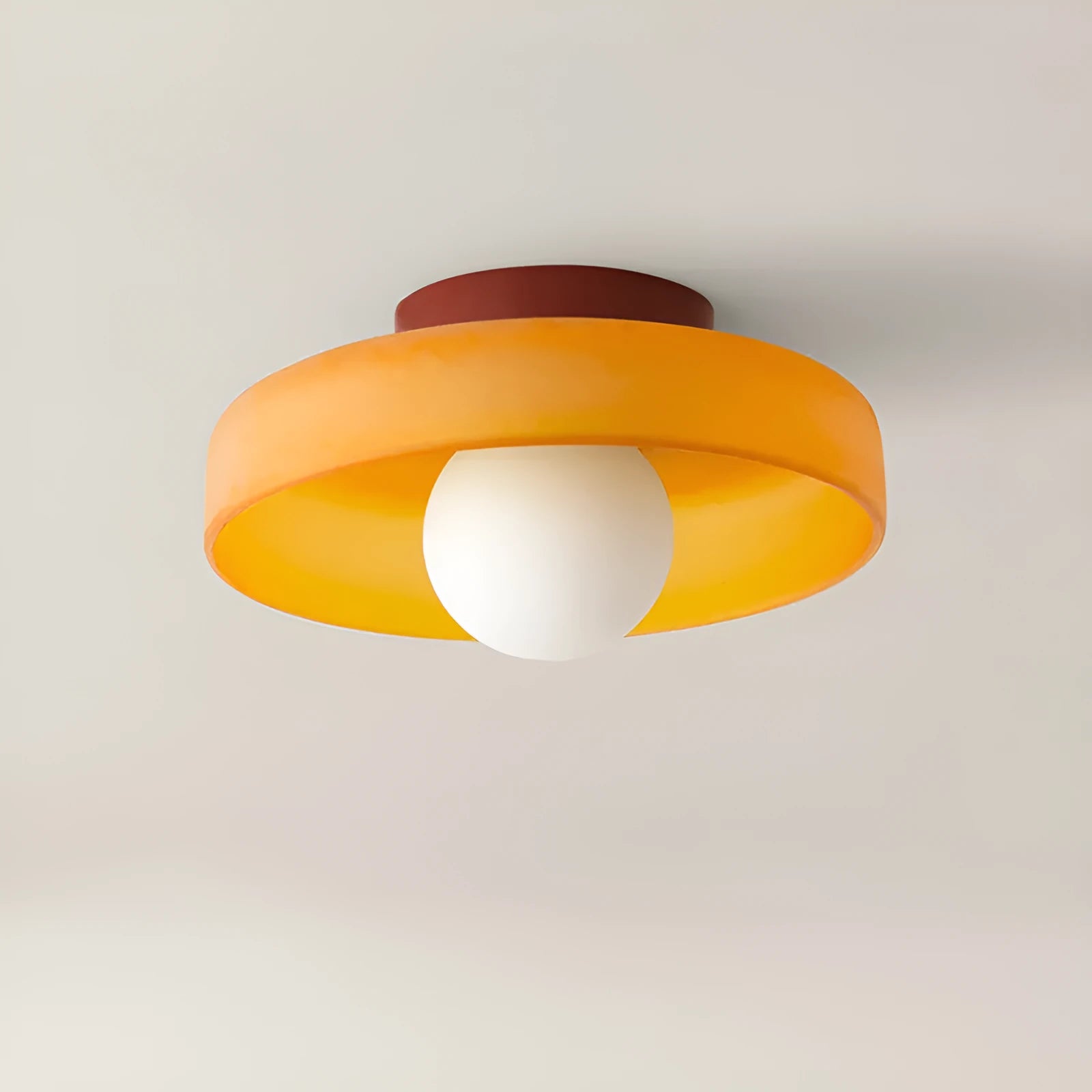 White round glass ceiling light fixture with a 25cm diameter shade.