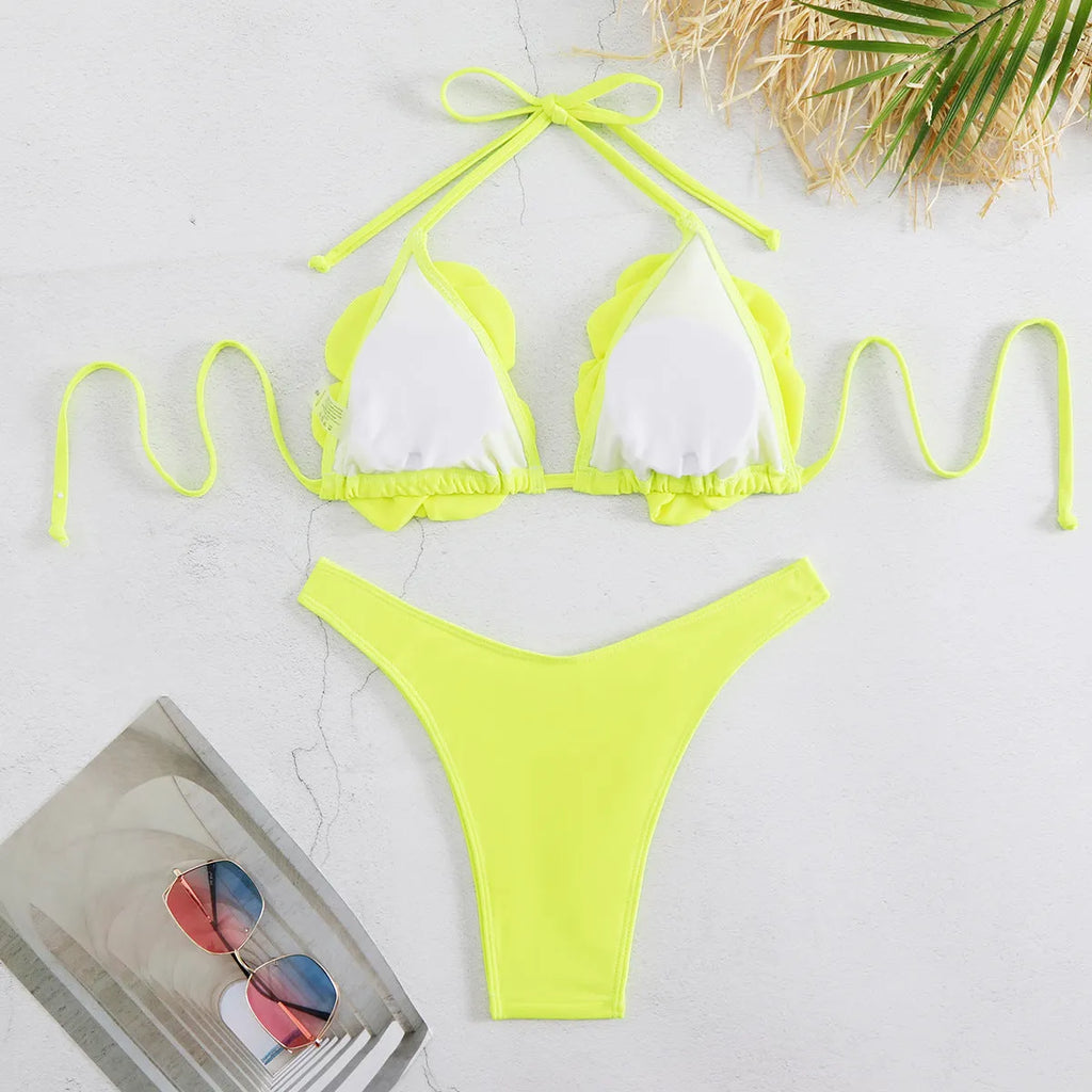 Three-dimensional 3D flower pattern on low waist bikini swimsuit in solid colour