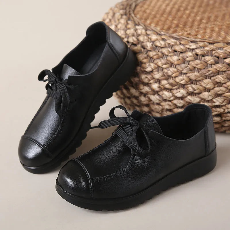 Women's work shoes in colour 6018 Black with round toe, front lacing, and anti-slip sole