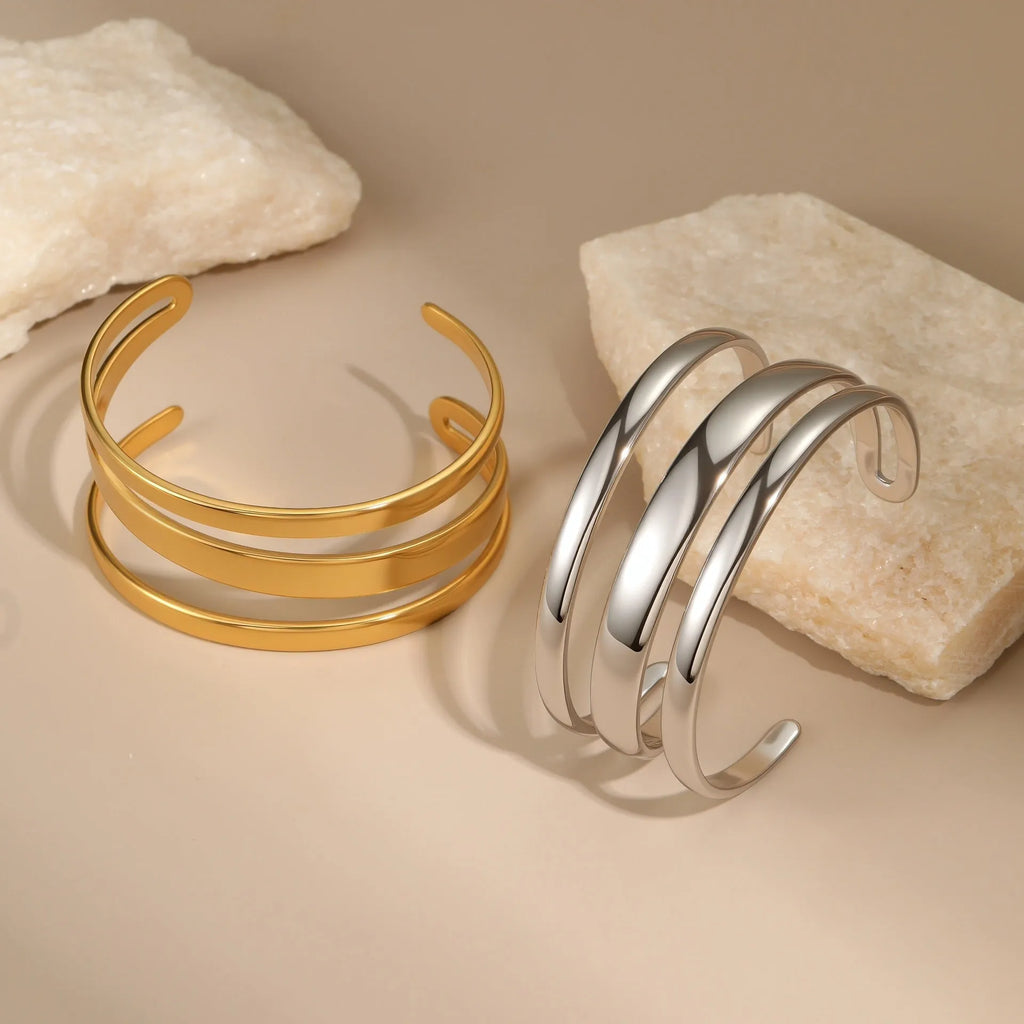 Women's geometric stainless steel bracelet with simple opening clasp in gold tone finish