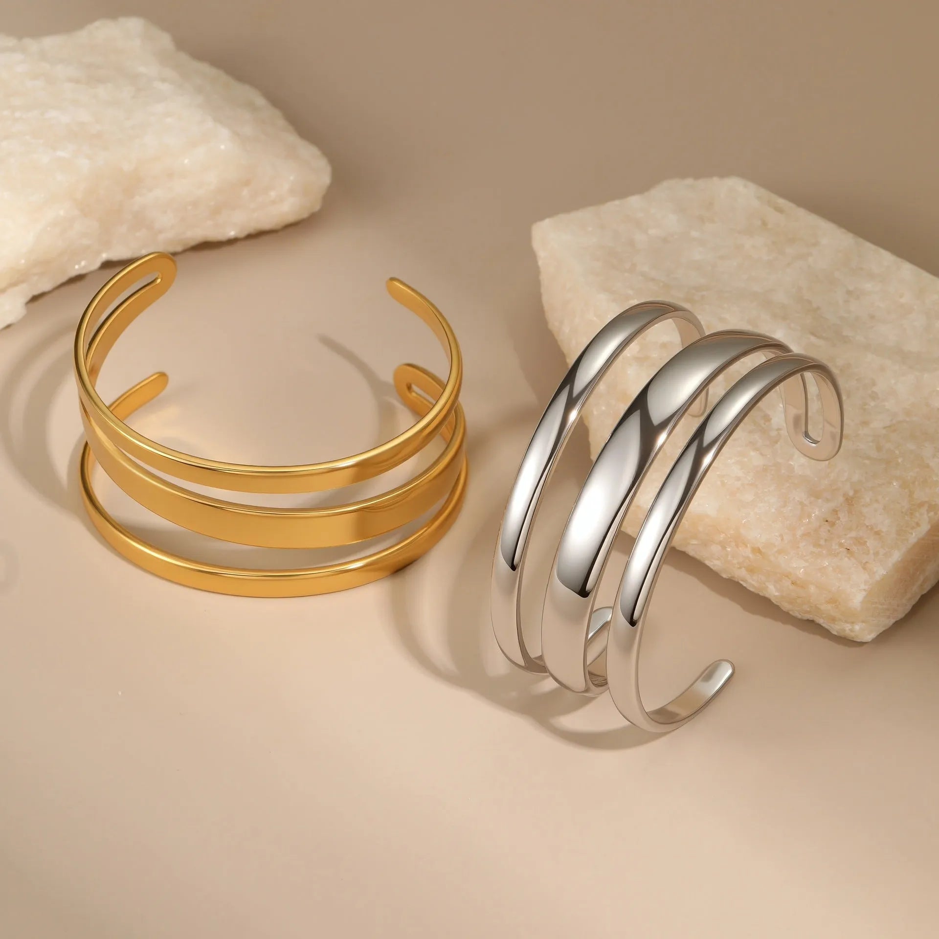 Women's geometric stainless steel bracelet with simple opening clasp in gold tone finish