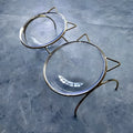 Raised glass cat bowl with golden metal rack and non-slip sleeves, 31x15x13.5cm, for pet food or water