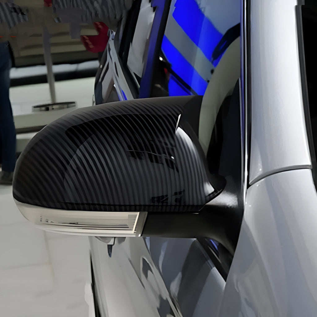 Pair of horn bright black plastic mirror reflector shells for Volkswagen Old Sagitar (2006-2011).