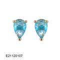Brass gold-plated drop earrings with pear-shaped zircon stones in a candy colour.