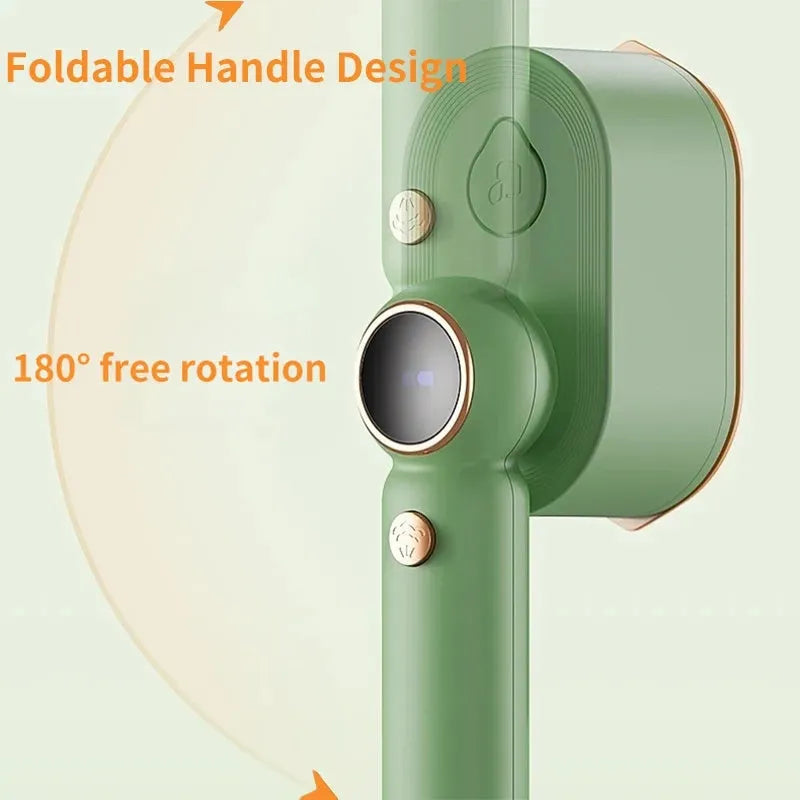 Green portable 1200W garment steamer with foldable handle on white background