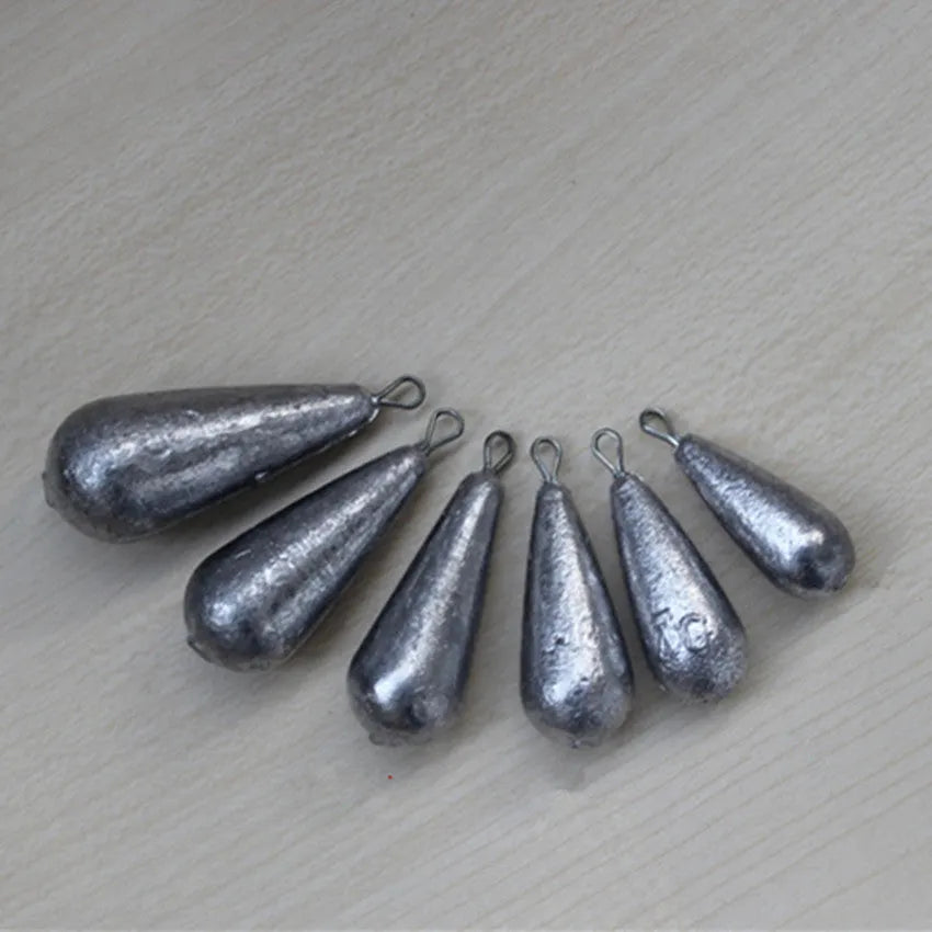 Set of drop-shaped lead fishing sinkers and a Tongxin sinker in various weights from 20g to 50g.
