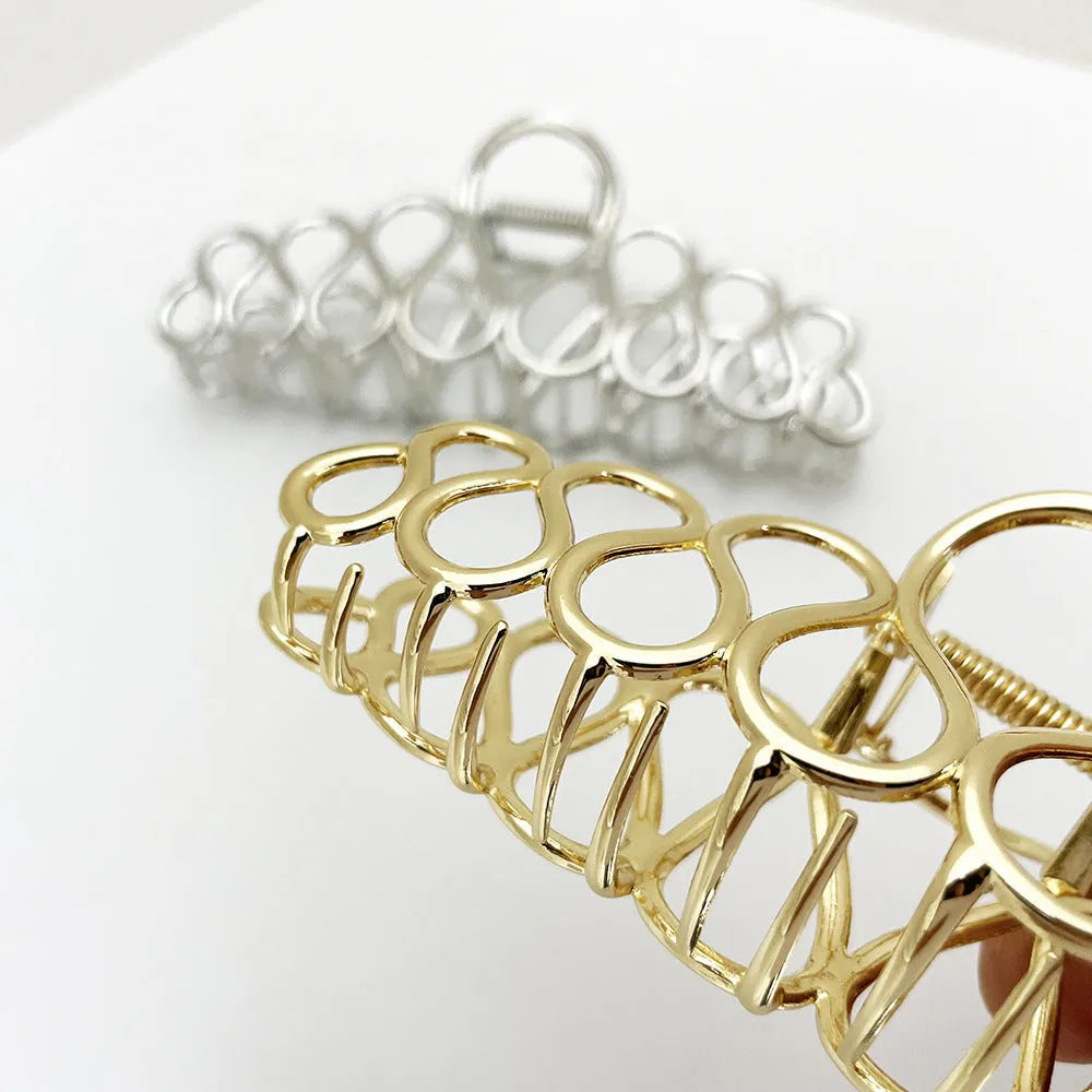 Large minimalist hair clip with tassel decoration in gold or silver electroplated finish
