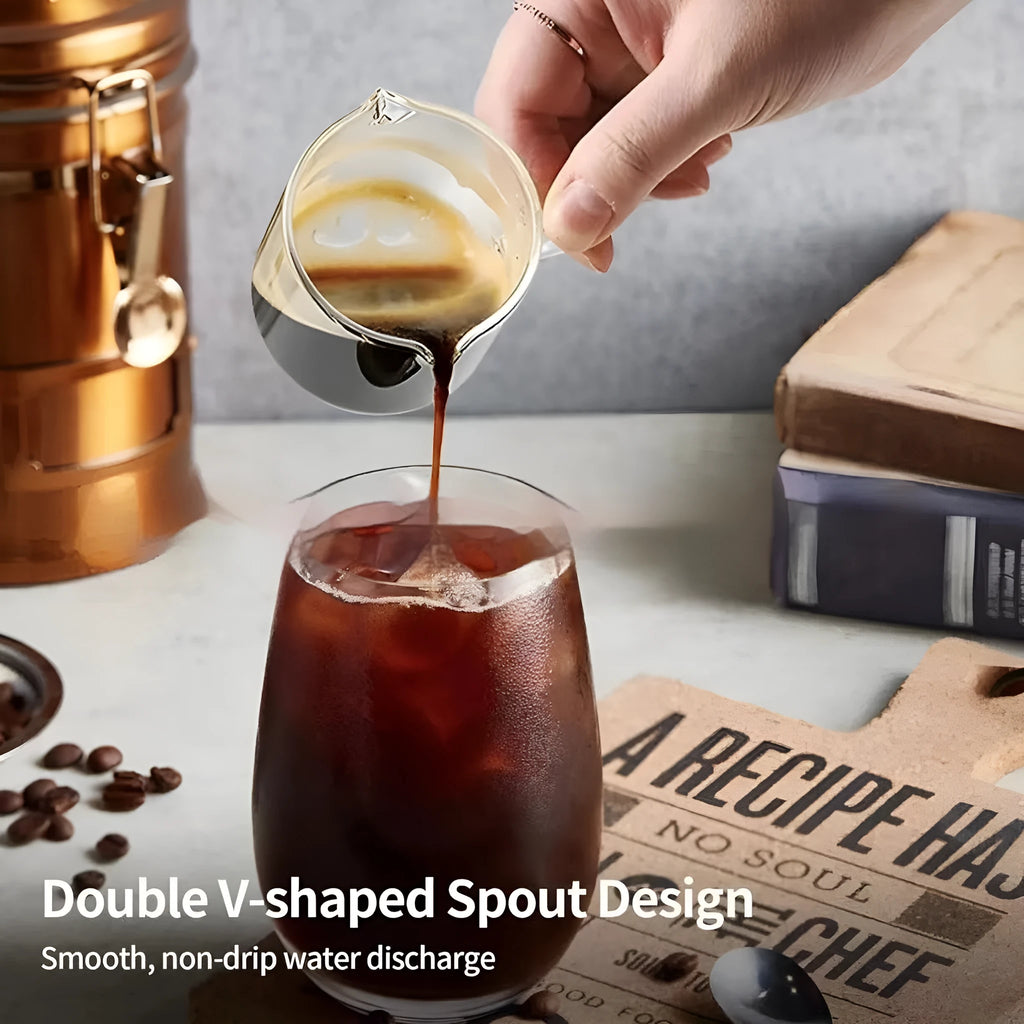Set of white transparent glass double mouth coffee cups on a table.