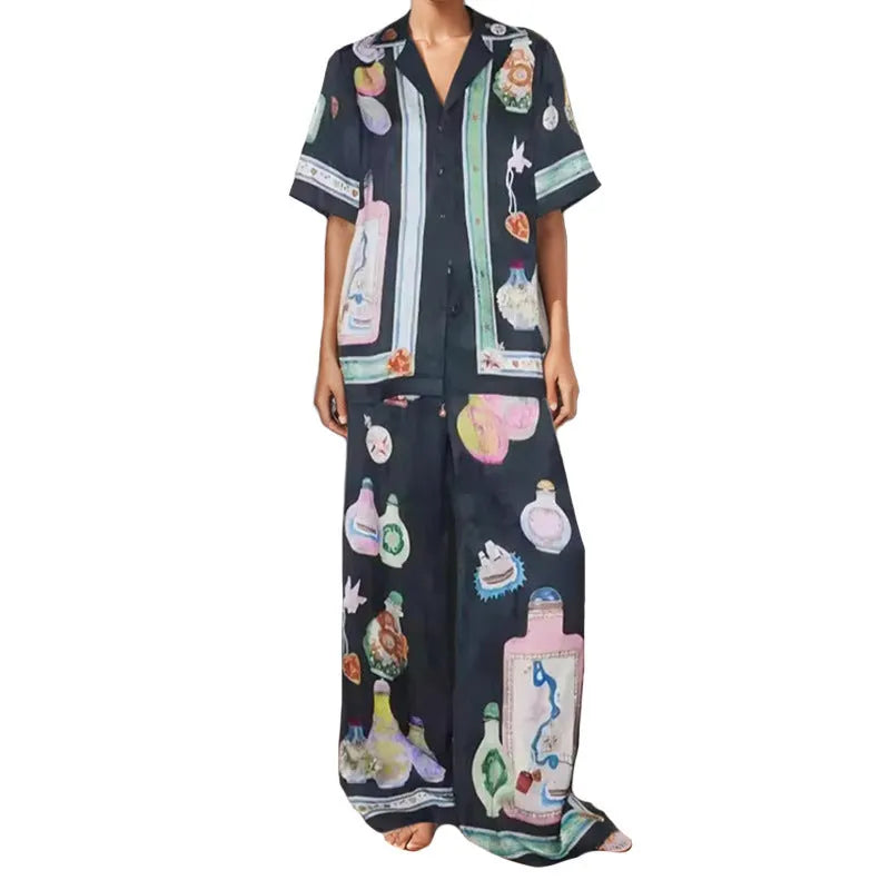 Black women's casual set with cartoon print, featuring a cardigan and matching trousers