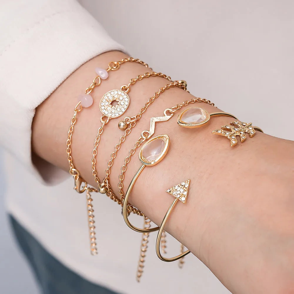 Six-piece women's bracelet set with golden spot drill arrow, water drop and V-shaped charms