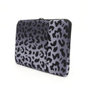 Leopard print laptop sleeve with polyester exterior and flannel lining for 13-inch to 16-inch devices