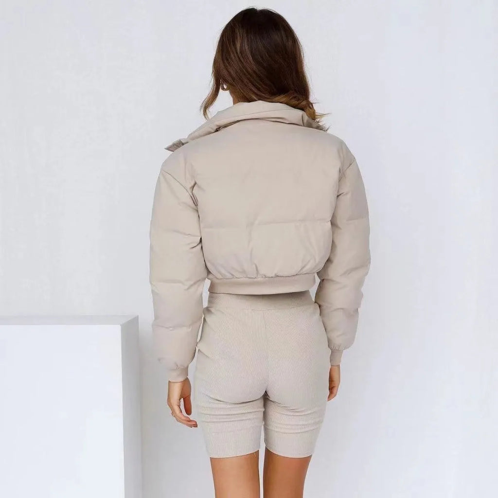 A woman's loose-fitting long sleeve polyester jacket in a casual style, shown in a blue colour variant.