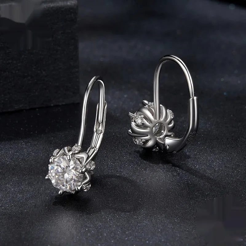 Sterling silver flower bud ear clip with moissanite stone and white gold plating