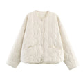 Women's bow quilted coat in polyester, straight cut, medium thickness, black colour, regular sleeves
