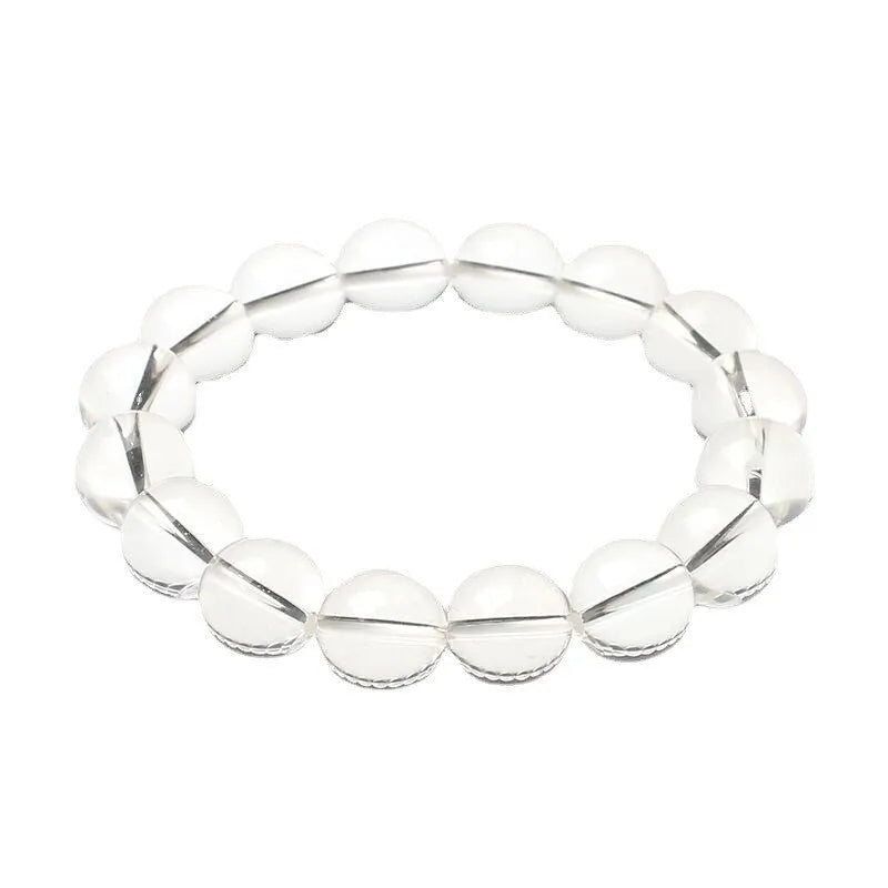 Natural Donghai old materials white water round bead crystal bracelet in old mine white on a wrist.