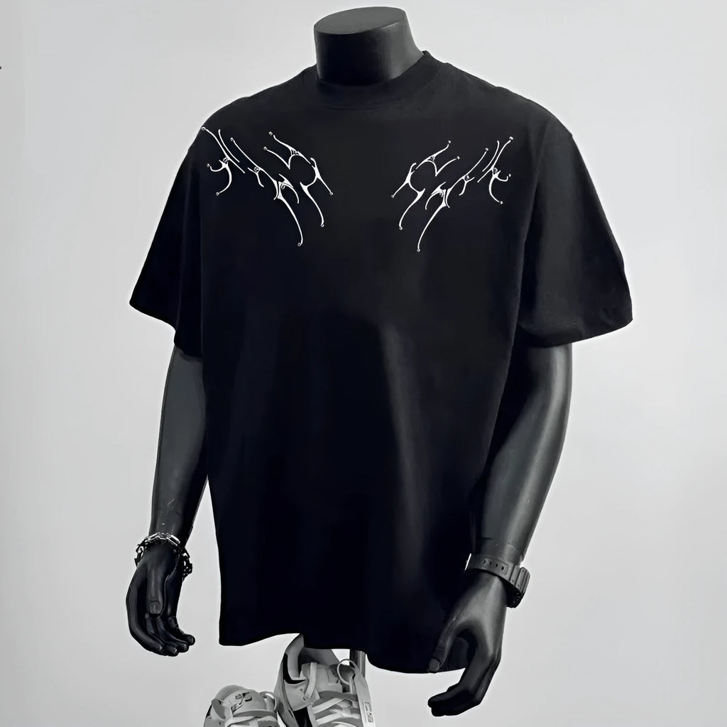 Man wearing a loose-fitting black pure cotton short sleeve top suitable for business casual wear.