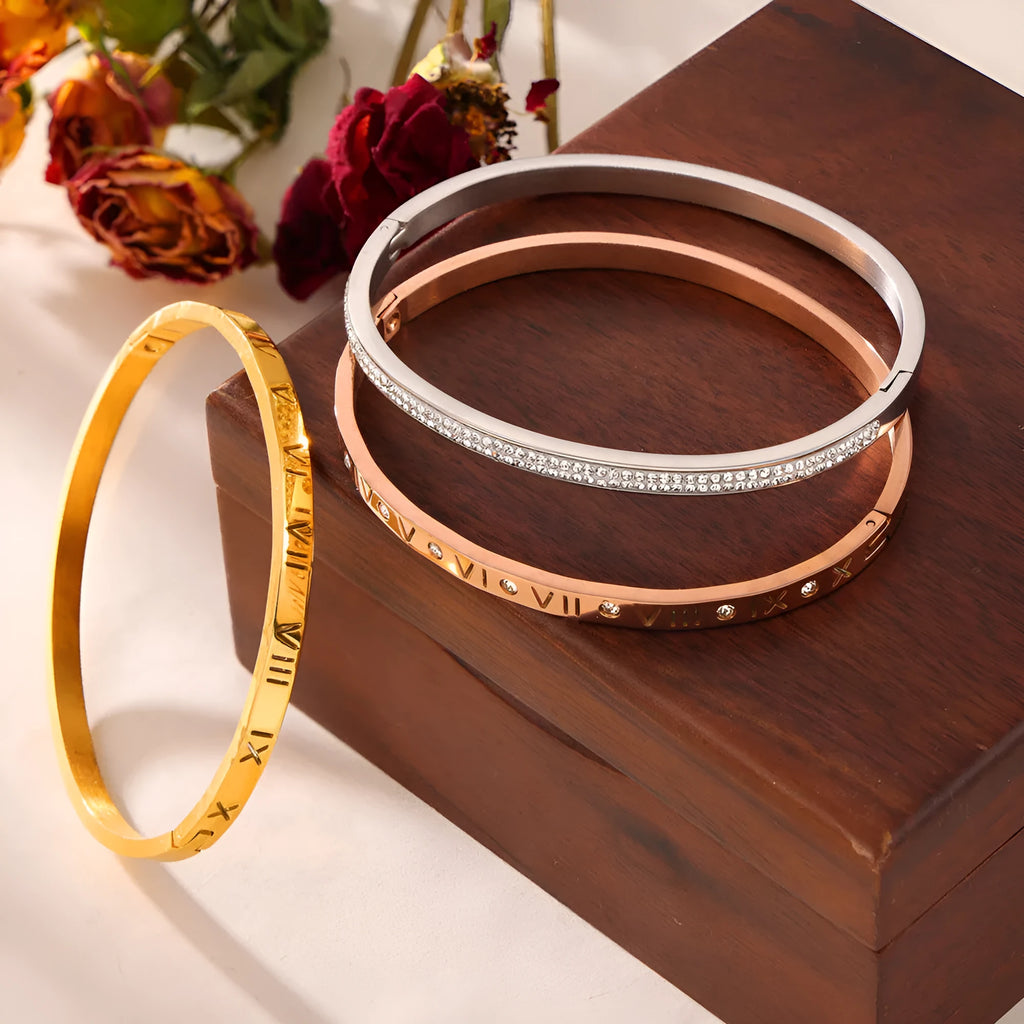 Retro Roman numeral titanium steel gold-plated bracelet with diamond accents on wrist