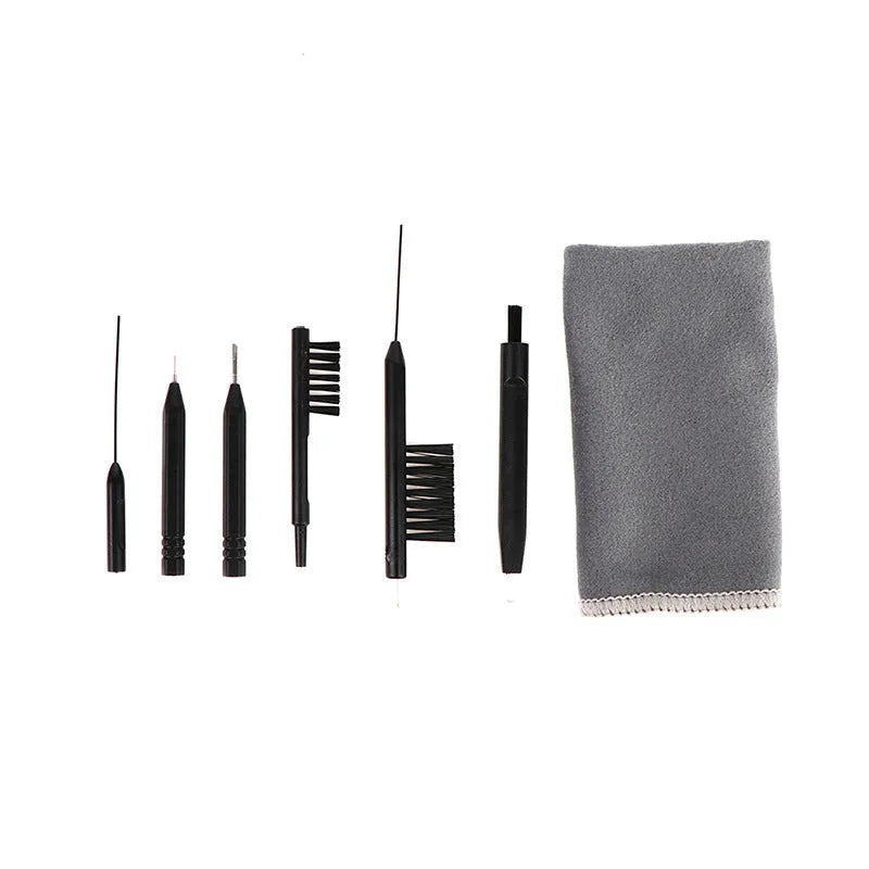 Digital hearing aid cleaning care suit with dry cloth, brush, ventilation rod, screwdriver, and needle removal tool in compact pack