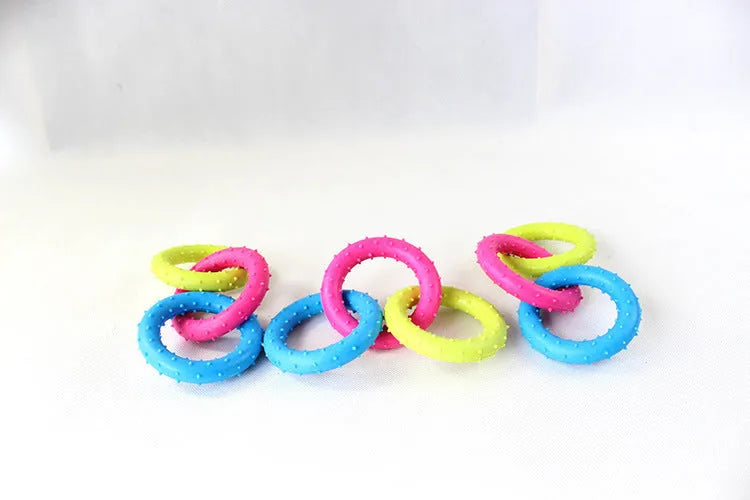 Three-chain TPR rubber dog molar toy for aggressive chewers shown in random colour