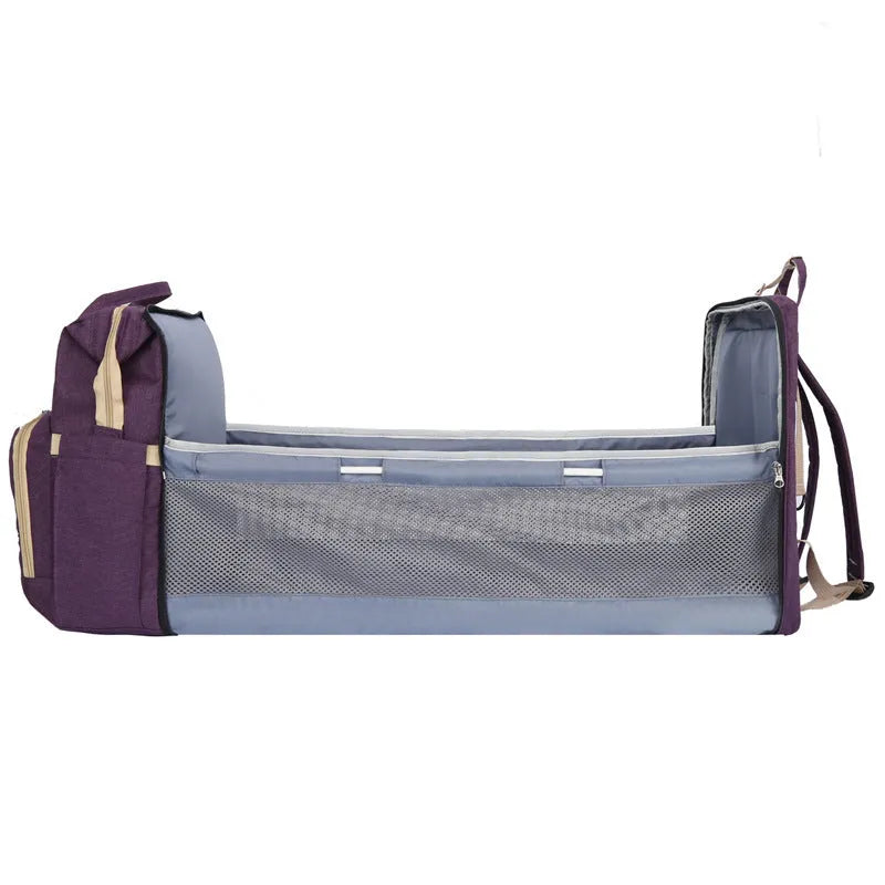 Lightweight nylon portable mummy bag with USB port and curved shoulder strap in various colours.