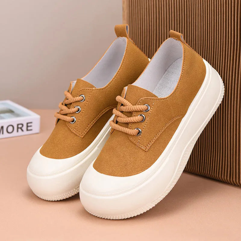 Women's beige suede platform loafers with a lace-up front and 4cm thick sole.