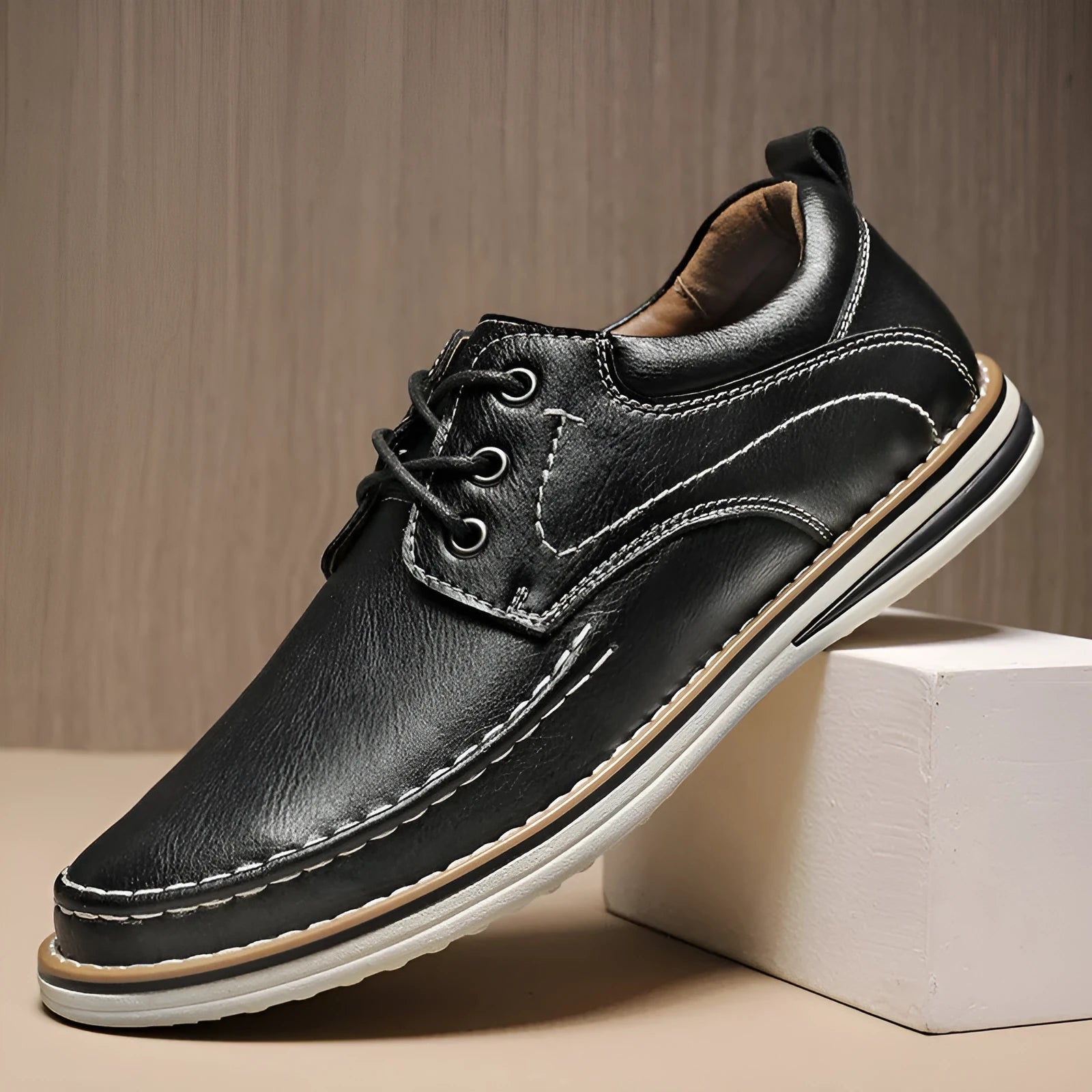 Men's black genuine leather casual lace-up shoes with round toe and low heel on a rubber sole.