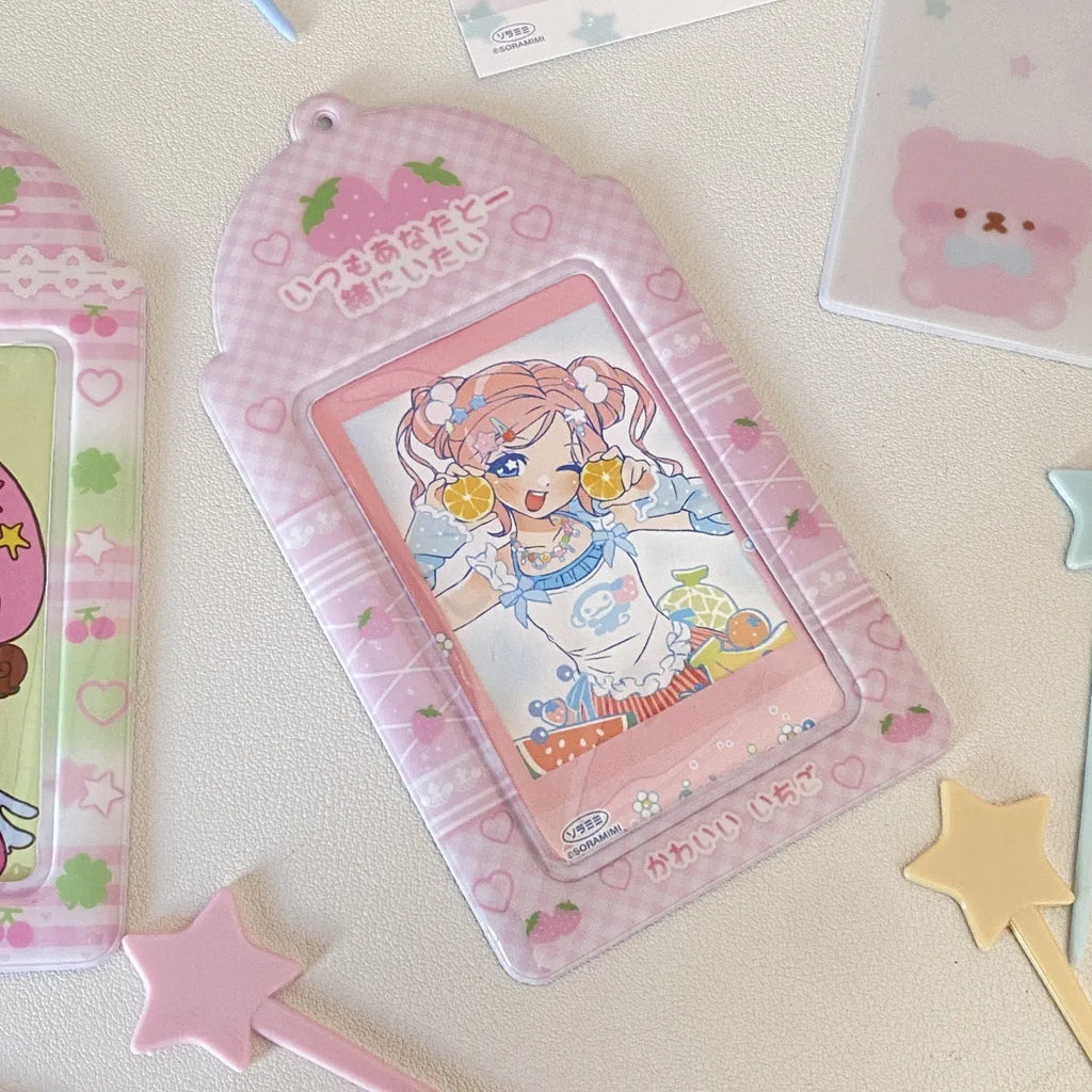 Cartoon strawberry and four-leaf clover PVC meal card holder pendants showing 3-inch card window